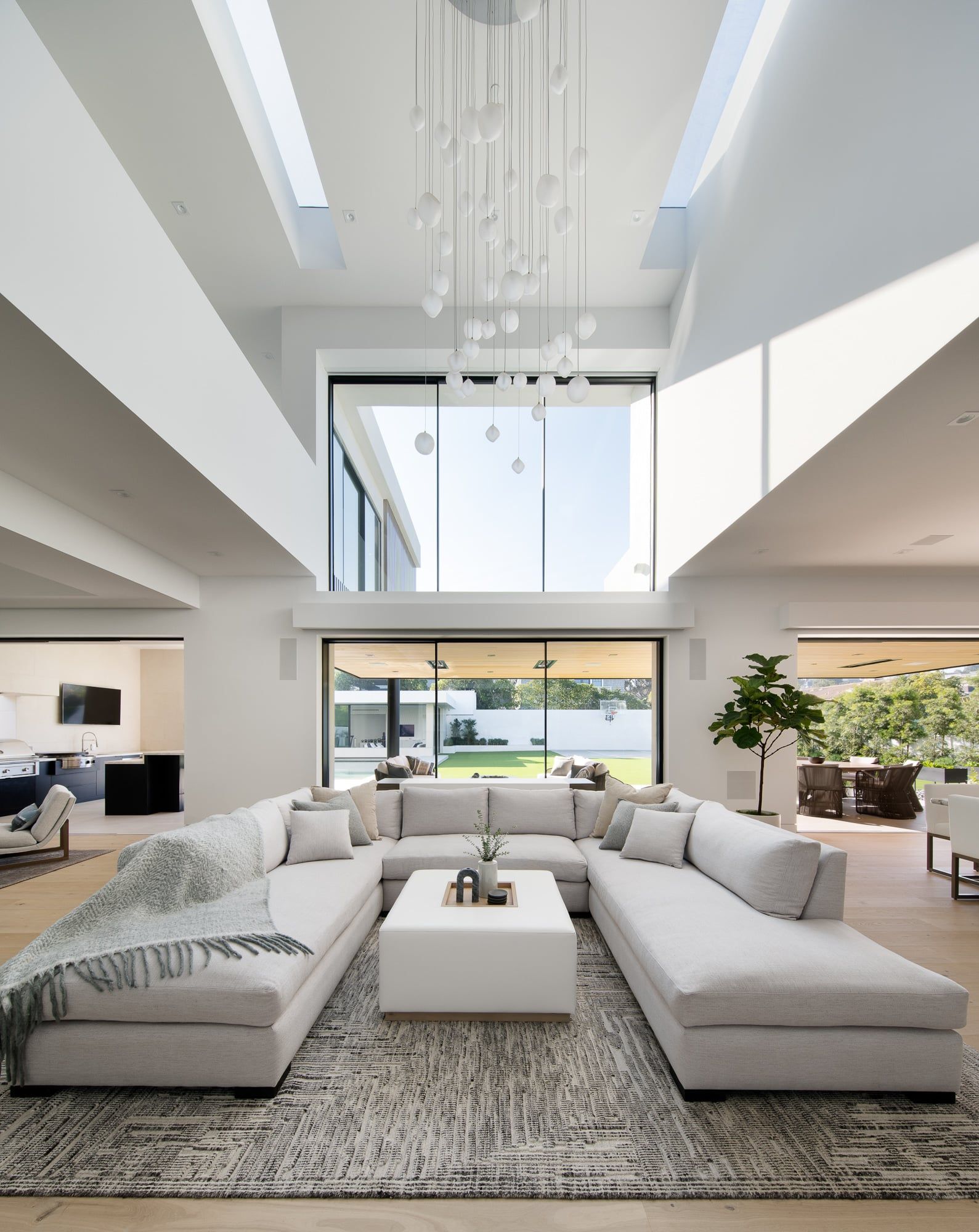 Double height living room with skylights